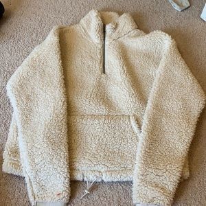 Light tan fuzzy quarterzip